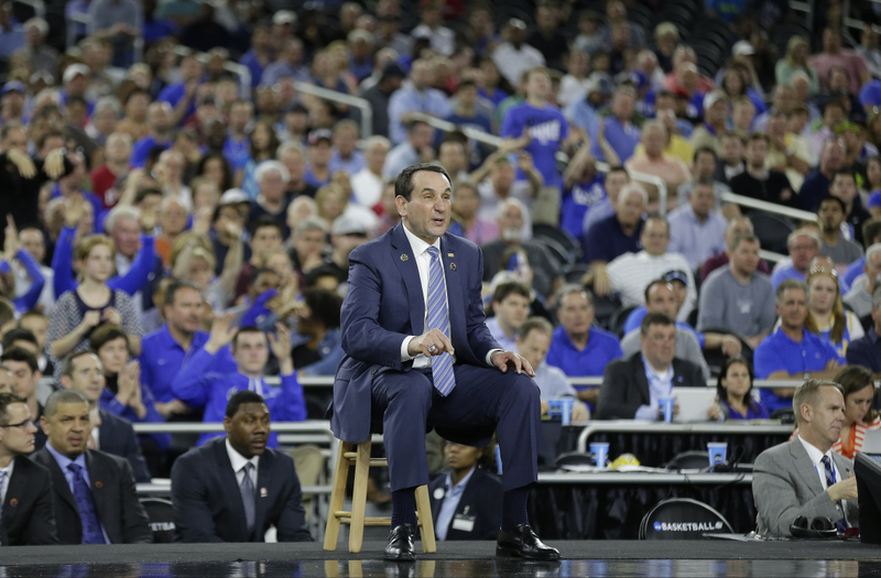 Illustration for article titled Eight Photos Of Coach K Sitting On A Lil' Stool